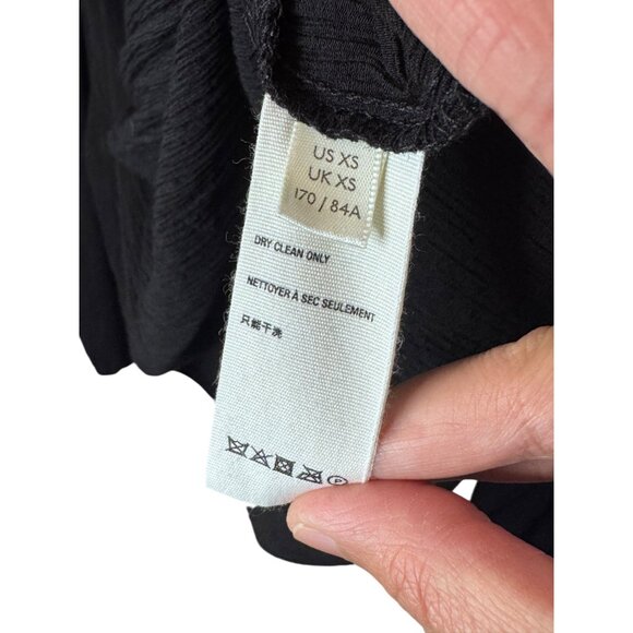 Free People black faux wrap hi-low pleated long sleeve top size XS - Picture 9 of 9